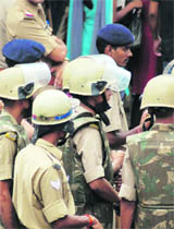 Policemen deployed at DAV College, Dehradun, on Tuesday.