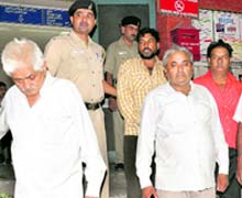 The arrested property dealers being taken for medical examination in Chandigarh on Wednesday