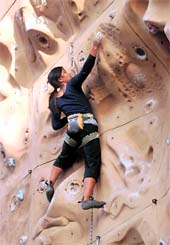 A girl practises her moves on an artificial wall set up at MCM DAV College-36 in Chandigarh