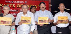 (From left) Delhi Chief Minister Sheila Dikshit, union minister for urban development S Jaipal Reddy, textiles minister Dayanidhi Maran and Delhi Metro chief E Sreedharan release a catalogue during the inauguration of a gallery on the crafts of India at the INA Metro station in New Delhi 