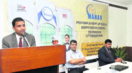 Vinod Srivastava of Clarks Inn addresses a press conference at the Madhuban Academy of Hospitality Management and Research in Dehradun on Wednesday.