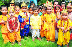 Students of Kidcare queue up to celebrate Janmashtami in Haridwar on Wednesday