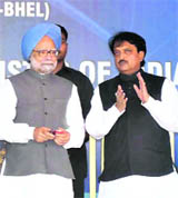 PM Manmohan Singh and Union Minister Vilas Rao Deshmukh near Tirupati.