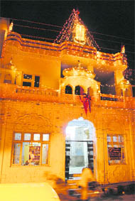 A temple is illuminated in Patiala on Wednesday as part of the Janmashtami celebrations