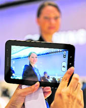 Samsung's latest tablet device "Galaxy Tab" is on display at the 50th edition of the "IFA" in Berlin on Thursday. The Galaxy Tab has a 7-inch touchscreen and uses Google's Android 2.2 operating system. IFA, the world's largest consumer electronics and home appliances fair, opens to the public from September 3 to 8.
