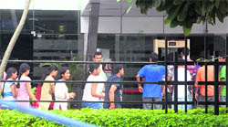 PU students enter a multiplex for a sponsored movie show. 