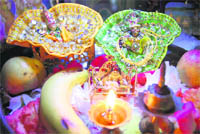 Lord Krishna dolls being worshipped at a Mussoorie home.