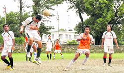 A match of the Senior Council Football Tournament in progress in Dehradun on Thursday. 