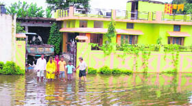 A waterlogged street in a locality in Dehradun on Thursday