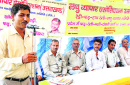 A labour union leader addresses a meeting in Haridwar on Thursday.