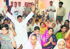 Devotees offer prayers at the Sanatan Dharam Pratap Temple in Srinagar on Thursday.