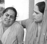 Inconsolable family members of the deceased. 