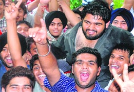 Prabhjot Singh, who has been elected as president, with his supports at GGDSD College, Sector 32, Chandigarh, on Friday.