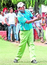 Mukesh Kumar goes for a big hit on the final day of the Rs 25-lakh PGTI Players Championship at the Chandigarh Golf Club on Friday.