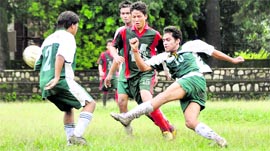 A match in progress at the Senior Council Football Tournament in Dehradun on Friday.