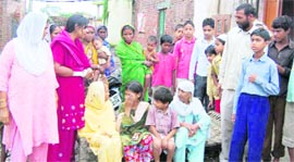The family members of the victim at Kargi basti in Dehradun on Friday.