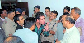 Former NSUI president argues with college teachers in the nomination room at the MPG College in Mussoorie on Friday.