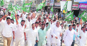 Activists of the INLD hold a protest against the postponement of zila parishad elections. The protesters submitted a memorandum to Deputy Commissioner RC Verma in Bhiwani on Friday.