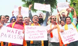 Members of the Shiv Sena (Hindustan) hold a demonstration in front of the UN office in Jammu on Friday in protest against the deployment of Chinese troops in occupied Kashmir.