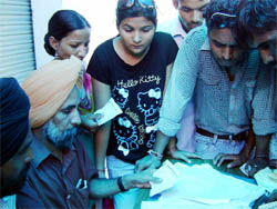 PSEB staff examining the documents of the students in Abohar on Saturday