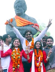 ABVPs Jitender Choudhary (centre), Priya Dabas (right) and Neetu Dabas (left) won the posts of president, vice-president and secretary, respectively, in DUSU elections, after the results were announced on Saturday.