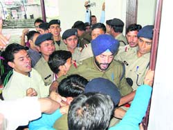 Policemen prevent students from barging into MPG College in Mussoorie 