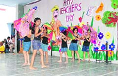 Students perform an umbrella dance at the Childrens Academy in Dehradun 