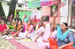 Women activists of the Uttarakhand Kranti Dal (UKD) stage a dharna in Dehradun 