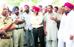The police tries to pacify a group at Chhapar village on Saturday