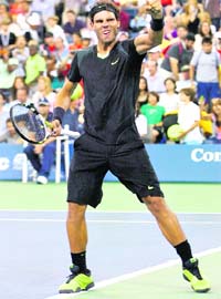 Rafael Nadal of Spain celebrates after defeating Denis Istomin of Uzbekistan at the USTA Billie Jean King National Tennis Center
