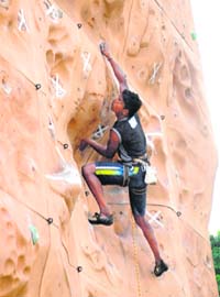A finalist take part in the National Lead Climbing Competition at MCM College in Chandigarh