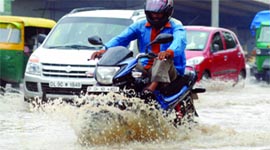 A view of the waterlogged Connaught Place after heavy rains in New Delhi on Sunday.