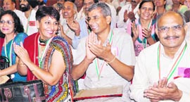Teachers applaud the announcement of the increase in their award money at a function in Chandigarh on Sunday.