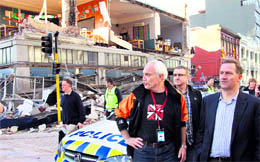 New Zealand's Prime Minister John Key (R) and city mayor Bob Parker (C) survey 
