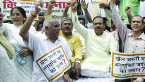 Delhi BJP activists protest against the state government over the Commonwealth Games in New Delhi on Monday.