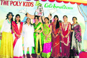 teachers of Poly Kids school pose after performing at a Teachers Day function in Dehradun on Monday.