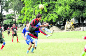 Players in action at the Senior Council Football Tournament in Dehradun on Monday. 