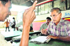 A member of the CB-CID team interrogates a roadways workshop employee in Haridwar
