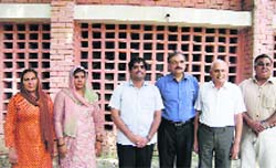 Bita along with DC Ajit Joshi after receiving a draft for Rs 25 lakh.
