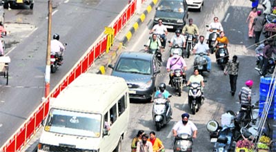 Vehicles stuck in a jam on a road near the CMC and Civil Hospital.