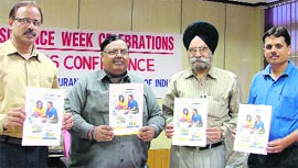 LIC employees launch new policies in Ludhiana on Monday.