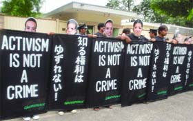 Greenpeace activists protest against the conviction of two members of their group by a Japanese court outside the Japan Embassy in New Delhi