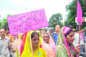 Women tea estate workers at a rally of trade unions in Dehradun on Tuesday.