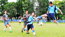 A player jumps in the air to attempt a goal during a match at the All-India Inter-Sschool Soccer Tournament in Dehradun on Tuesday. 