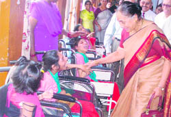 Governor Margaret Alva with inmates of Cheshire Home in Dehradun on Tuesday
