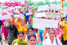 Workers of government departments, banks and other public sector undertakings hold a demonstration