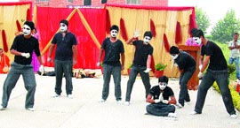 Students of Kamla Nehru School, Phagwara, present a mime on the school premises.
