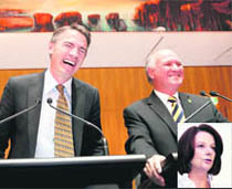 KINGMAKERS: Two independent MPs, Rob Oakeshott (left) and Tony Windsor, attend a news conference where they declared their support for the incumbent Labor government; and (right) Australia's PM Julia Gillard speaks during a news conference in Canberra on Tuesday. 