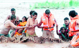 The rescue team saves two women from the Ghaggar in Panchkula on Wednesday