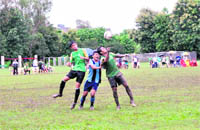 Players in action during a match at the RIMC All-India Inter-School Soccer Tournament in Dehradun